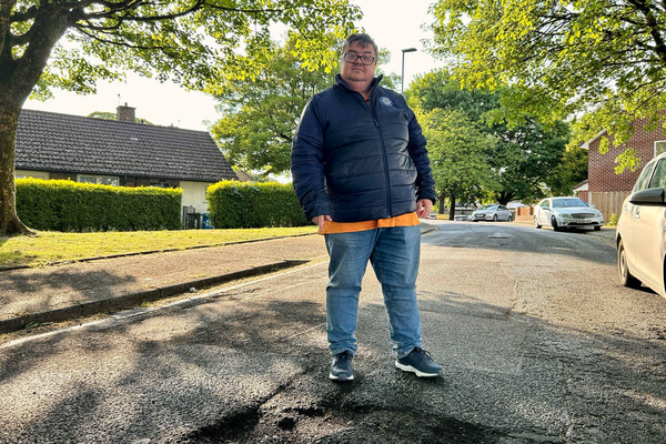 Tom Shaw with a pothole.
