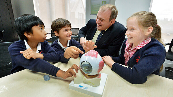 Reform SEND services Ed Davey with children